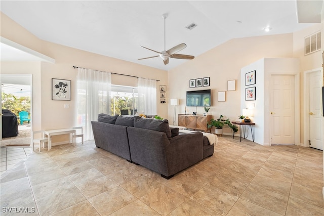 living room featuring ceiling fan and high vaulted ceiling