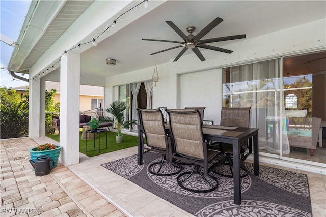 view of patio featuring ceiling fan