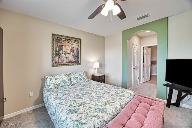 bedroom with light colored carpet and ceiling fan