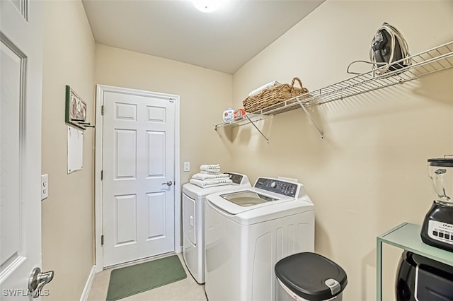 laundry room with washer and clothes dryer