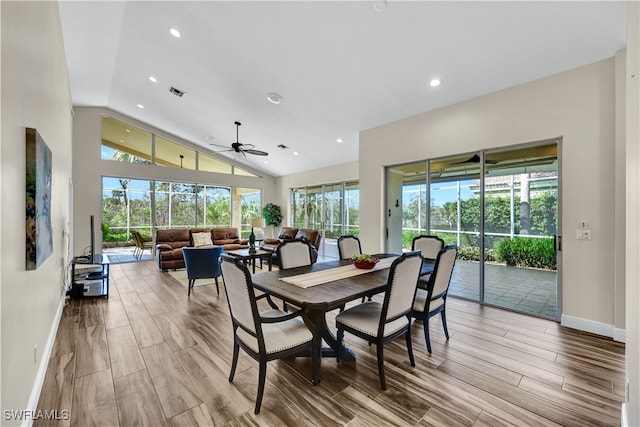 dining room featuring ceiling fan, plenty of natural light, and light hardwood / wood-style flooring