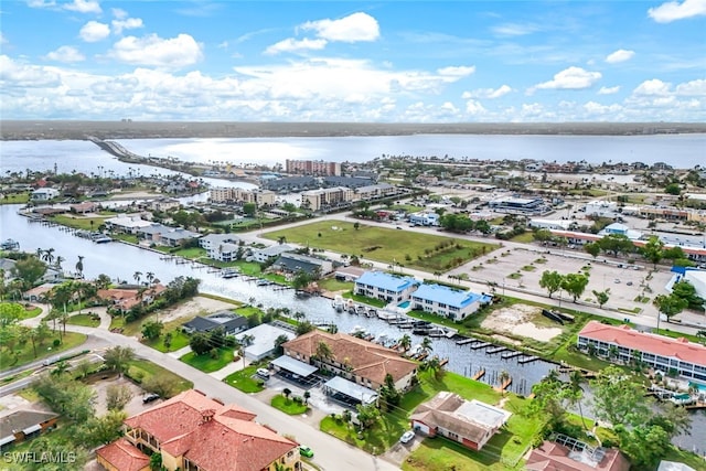 drone / aerial view with a water view