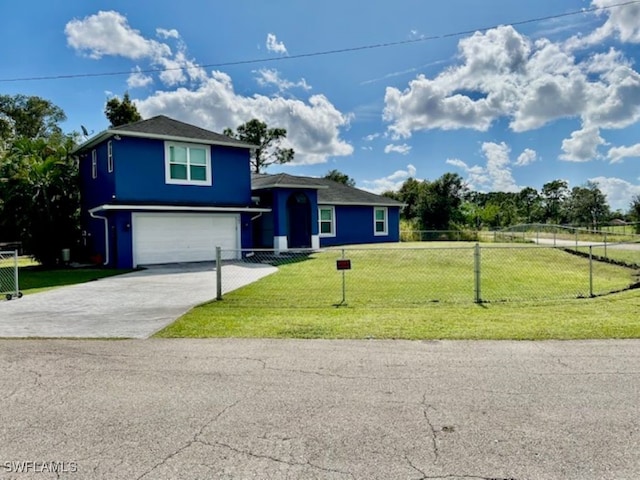 view of front of property with a garage and a front yard