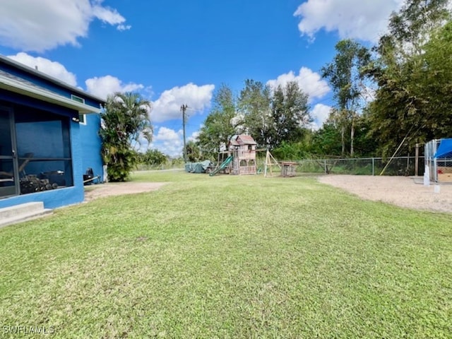 view of yard with a playground