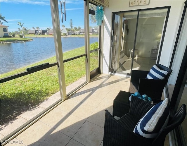 sunroom with a water view