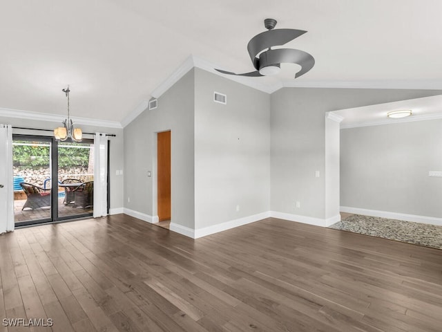 spare room with ornamental molding, dark hardwood / wood-style flooring, and lofted ceiling