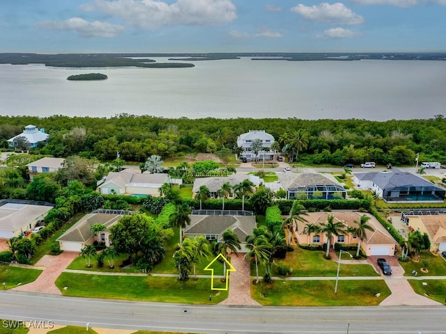 bird's eye view with a water view