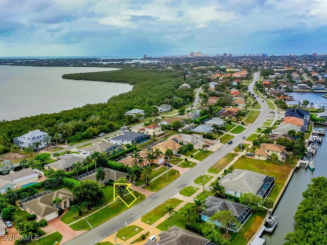 bird's eye view with a water view