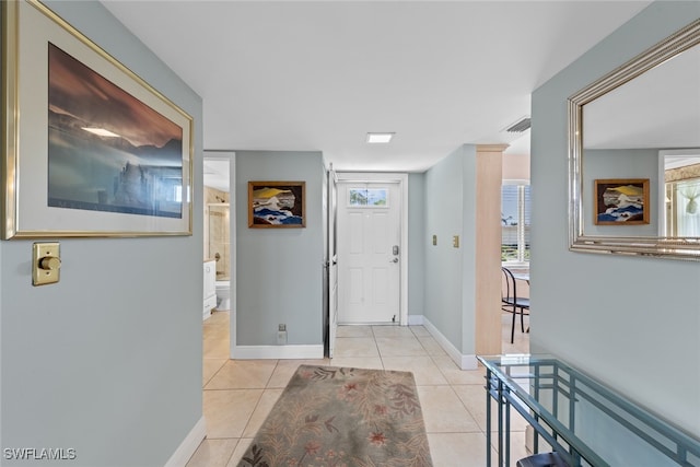 entrance foyer with light tile patterned flooring