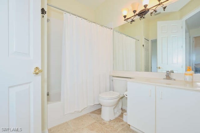 full bathroom featuring toilet, an inviting chandelier, shower / tub combo, vanity, and tile patterned floors