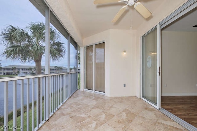 balcony featuring ceiling fan