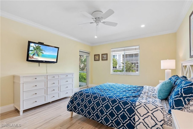 bedroom with ceiling fan and crown molding