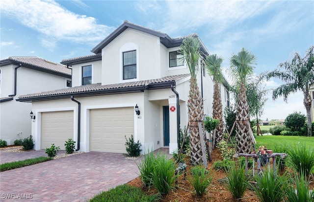 view of front of home with a garage