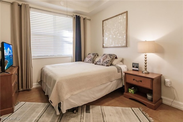 bedroom featuring a tray ceiling