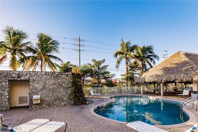 view of pool with a gazebo and a patio