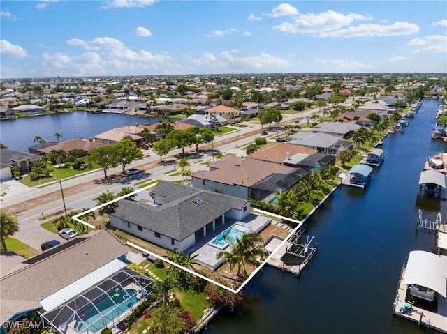 drone / aerial view featuring a water view