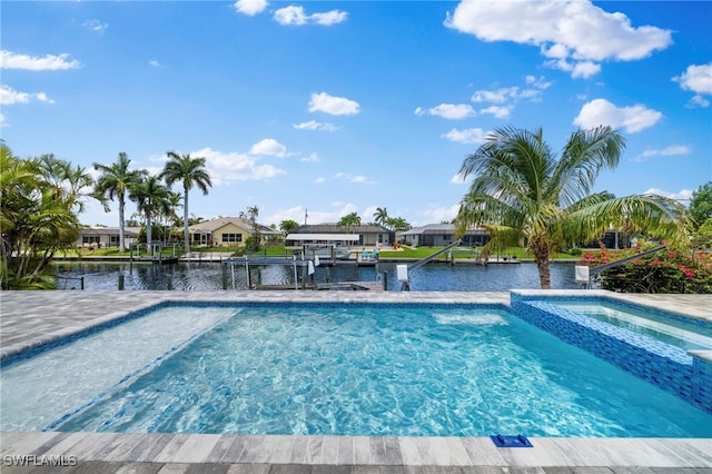 view of pool featuring a water view