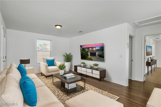 living room featuring dark hardwood / wood-style floors