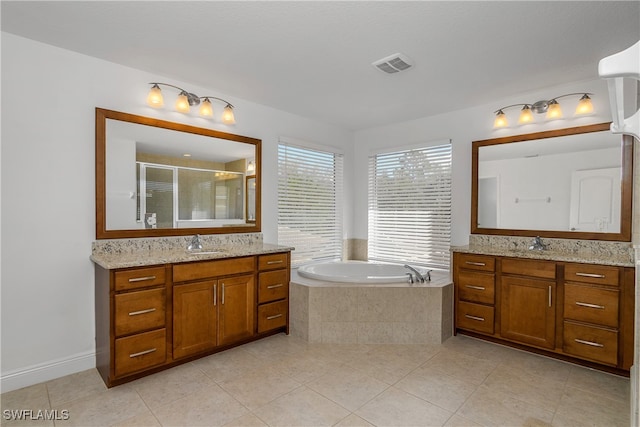 bathroom with separate shower and tub, tile patterned flooring, and vanity