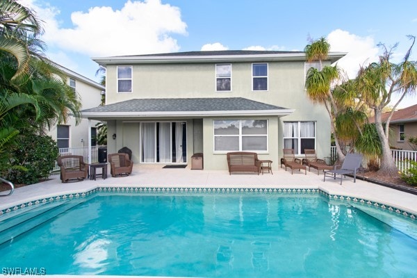 rear view of property with a patio area