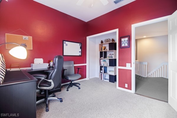 office featuring carpet flooring and ceiling fan