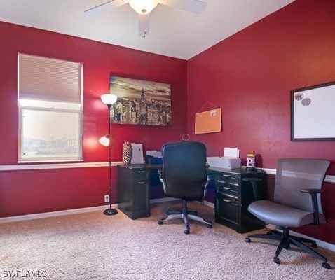 home office featuring carpet floors and ceiling fan