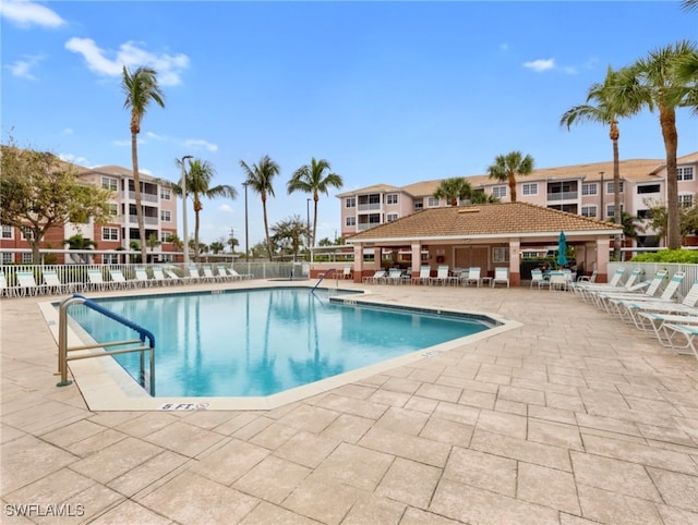 view of swimming pool featuring a patio area