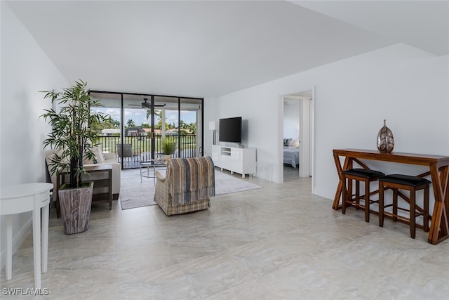 living room with a wall of windows