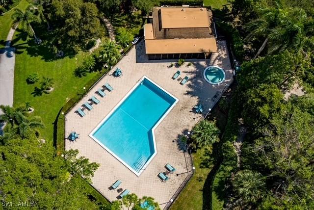413 Augusta Blvd Unit 205, Naples, FL 34113 - aerial view of property and surrounding area with a pool