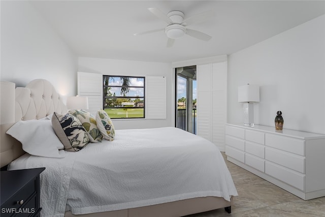 bedroom featuring access to outside and ceiling fan