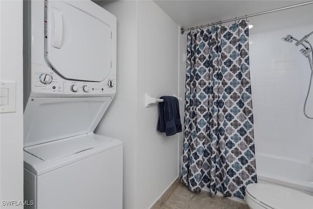 413 Augusta Blvd Unit 205, Naples, FL 34113 - full bath featuring estacked washer and dryer and toilet