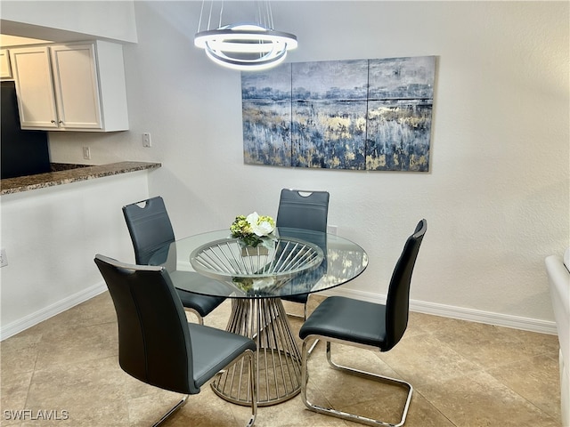 view of tiled dining area