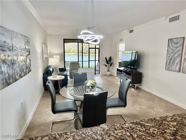 dining area with light tile patterned flooring, an inviting chandelier, and crown molding