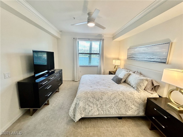 bedroom with ornamental molding, light carpet, and ceiling fan