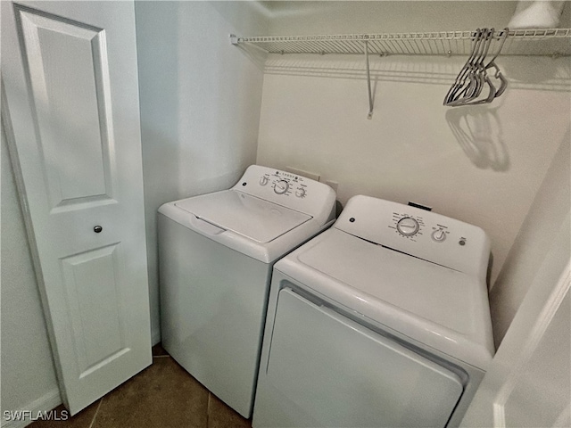 washroom with separate washer and dryer