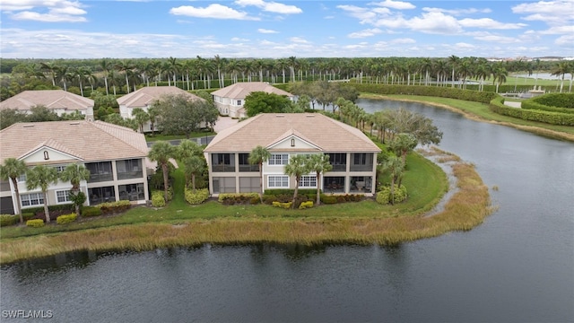 drone / aerial view with a water view