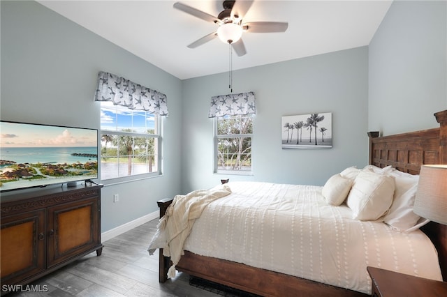 bedroom with hardwood / wood-style floors and ceiling fan