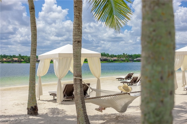 water view featuring a beach view and a gazebo