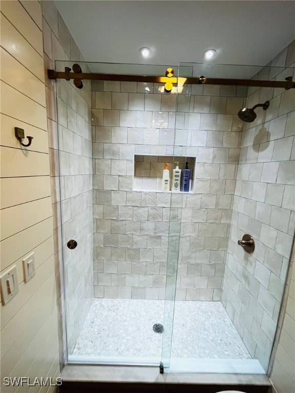 bathroom with an enclosed shower