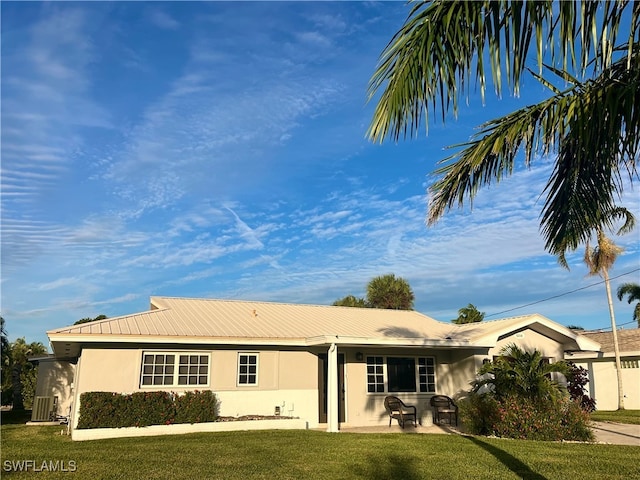 single story home with a patio and a front yard