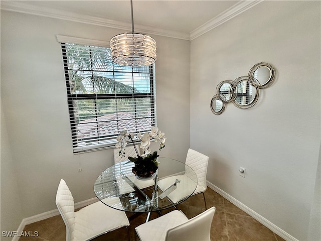 dining room with ornamental molding, a notable chandelier, and a healthy amount of sunlight