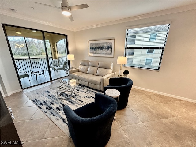 tiled living room featuring ceiling fan, plenty of natural light, and crown molding