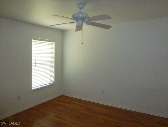 empty room featuring hardwood / wood-style floors and ceiling fan