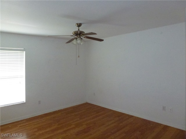 spare room featuring ceiling fan and wood-type flooring