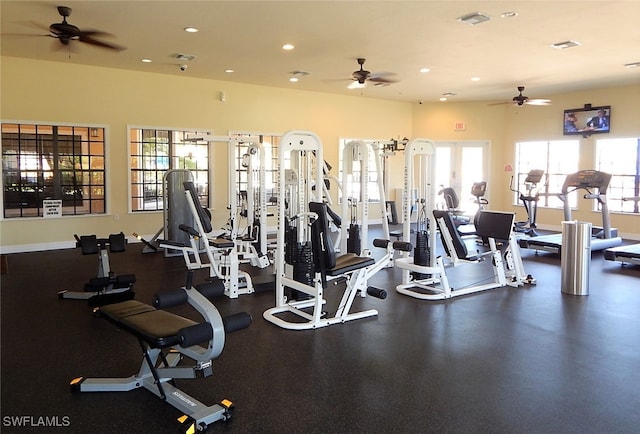 exercise room with ceiling fan and plenty of natural light