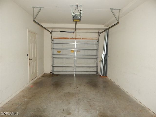 garage featuring a garage door opener