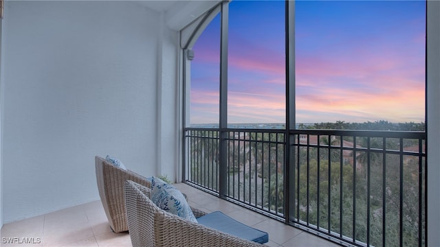 view of balcony at dusk