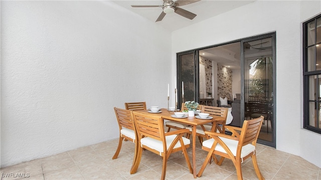 dining space with ceiling fan