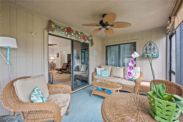 sunroom / solarium with ceiling fan