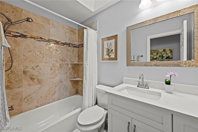 full bathroom featuring shower / tub combo, vanity, and toilet